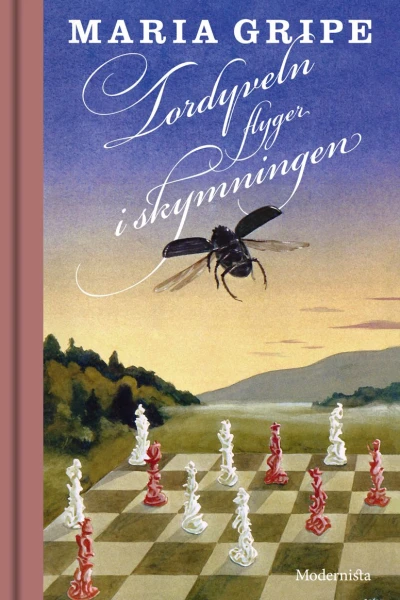 Tordyveln flyger i skymningen